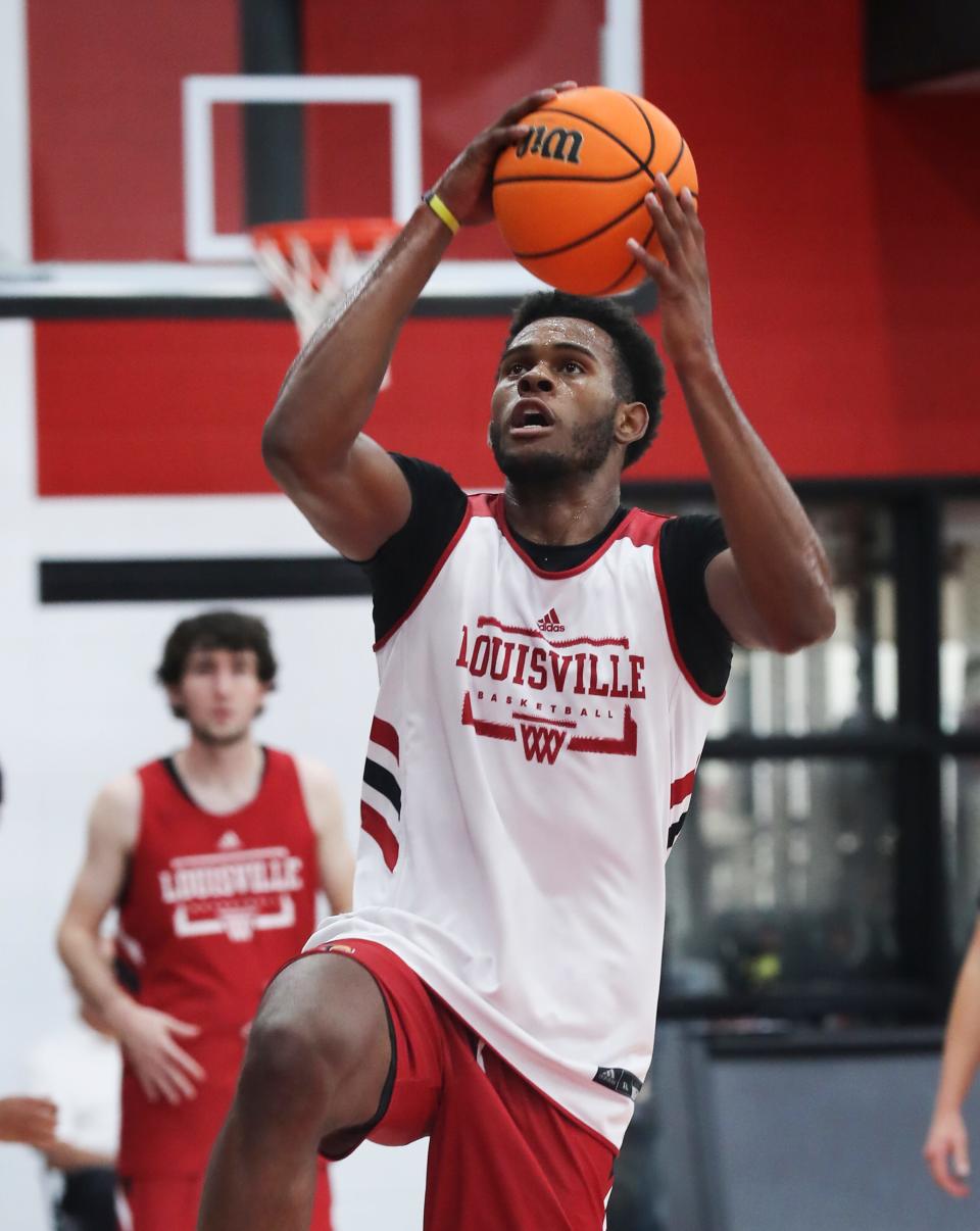 U of L's Roosevelt Wheeler (4) drives to the basket during the first practice of the season at the Kueber Center in Louisville, Ky. on Sep. 30, 2021.
