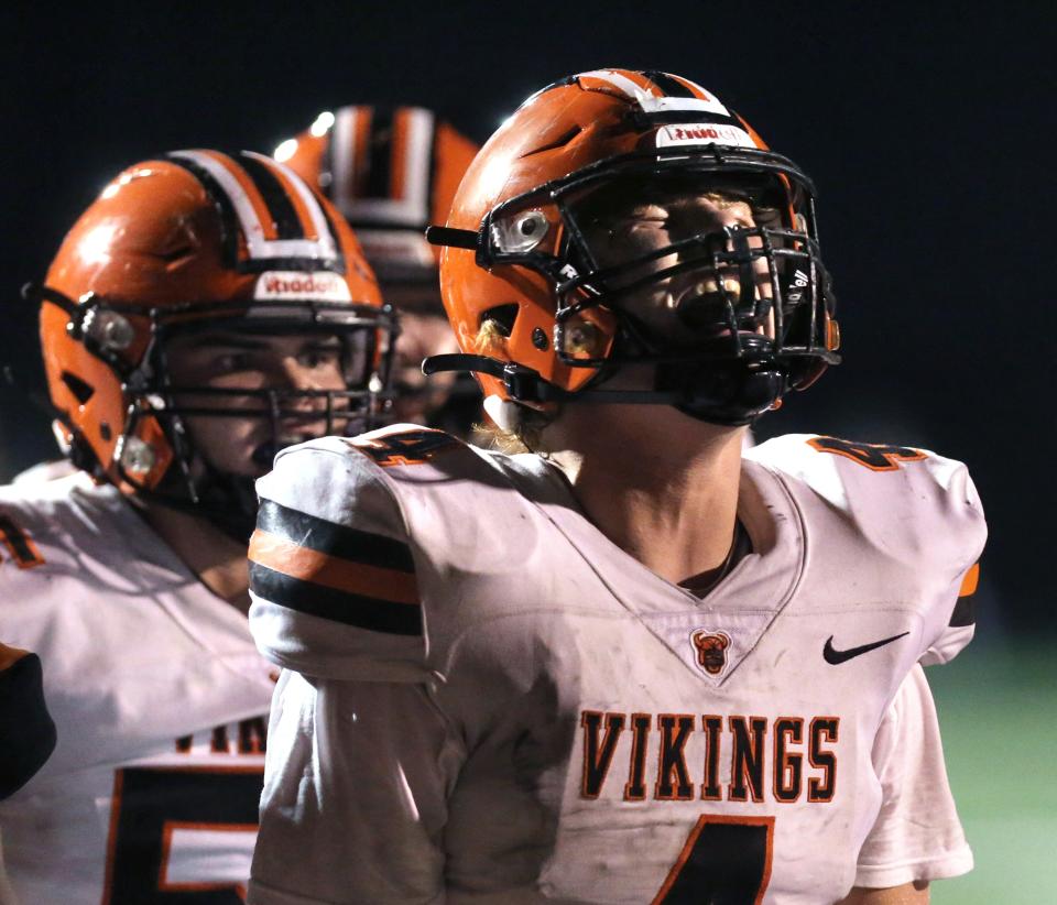 Drew Logan of Hoover reacts after scoring a touchdown during their game at Green on Friday, Oct. 15, 2021. 