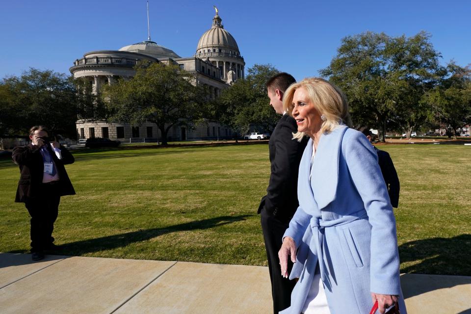 Mississippi Attorney General Lynn Fitch walks past the Mississippi State Capitol as the Capitol Police respond to a bomb threat at the statehouse and the Mississippi Supreme Court building in Jackson, Miss., Thursday morning, Jan. 4, 2024. The police were dealing with the second consecutive day of threats.