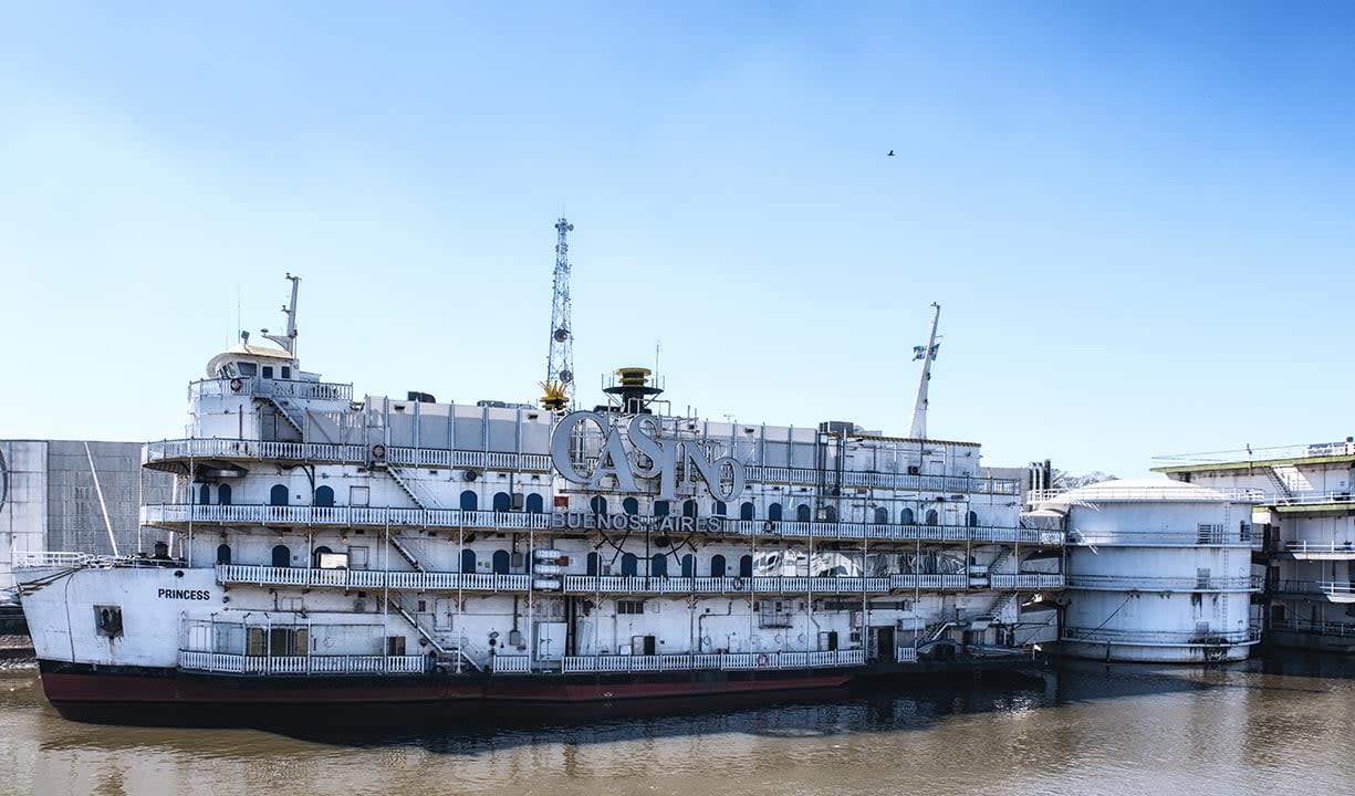 View of casino boat docked in river in Buenos Aires.