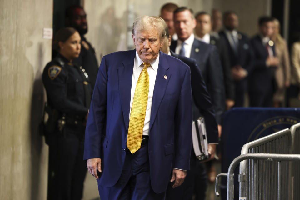 Former President Donald Trump arrives at Manhattan criminal court before his trial in New York, Thursday, May 2, 2024. (Charly Triballeau/Pool Photo via AP)