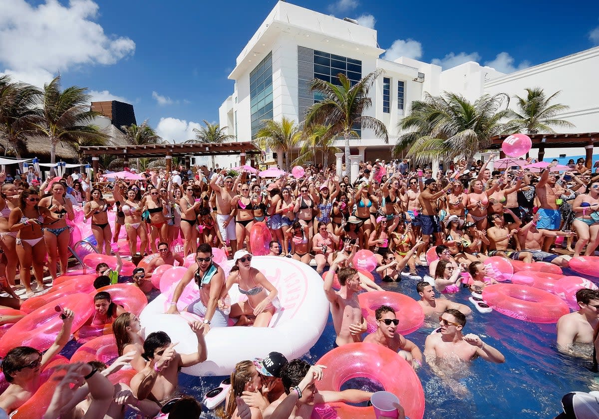 Spring break revellers in Cancun, Mexico, in 2016 (Dimitrios Kambouris/Getty Images for Victoria's Secret Pink)