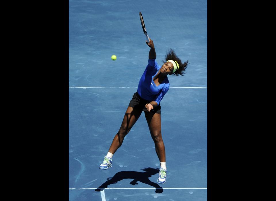 Serena Williams returns a ball against Danish Caroline Wozniacki during their match of the Madrid Masters on May 10, 2012 at the Magic Box (Caja Magica) sports complex in Madrid. Williams won 1-6, 6-3, 6-2. 