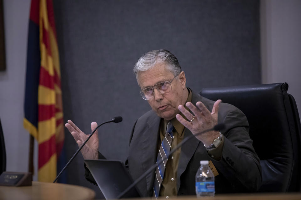 Cochise County District 1 Supervisor Tom Crosby, responds to criticisms over a proposed transfer of election functions and duties to the county recorder at the Cochise County Board of Supervisors meeting, Tuesday, Feb. 14, 2023, in Bisbee, Ariz. Activists are circulating petitions to recall Crosby, one of the two Republicans who voted for the hand count in October. (AP Photo/Alberto Mariani)