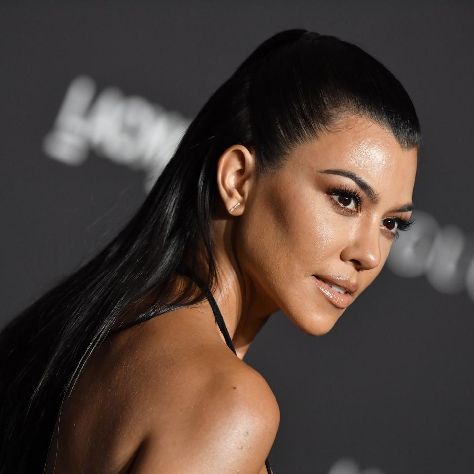 Kardashian had no time for Turkey Day trolls who asked if the reality star was expecting.