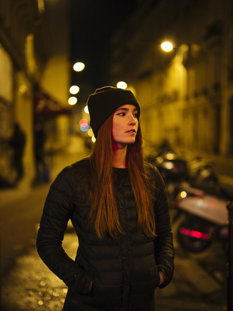 In this Nov. 8 2019 photo, Sarah, 23, a stylist from Paris poses for a portrait in Paris. Sarah felt privileged over other women because she never experienced any form of violence. For Sarah, the time has come for action rather than words. Activists have pasted signs all over Paris to pressure authorities to do more to help victims of domestic violence, whom they say law enforcement too often fail to protect. (AP Photo/Kamil Zihnioglu)