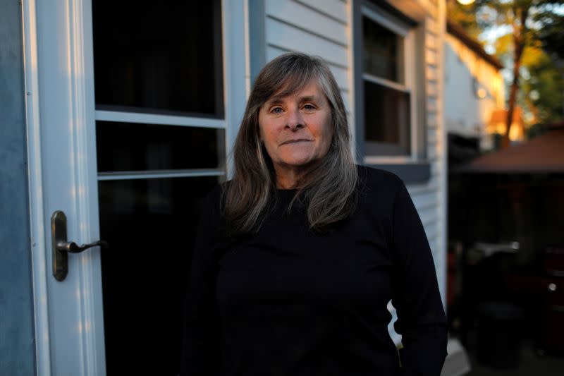 Peggy Padovano, 63, a legal assistant, poses at her home on Staten Island in New York City