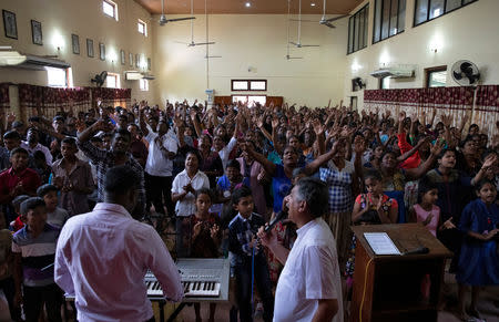 Members of Zion Church, which was bombed on Easter Sunday, pray at a community hall in Batticaloa, Sri Lanka, May 5, 2019. REUTERS/Danish Siddiqui