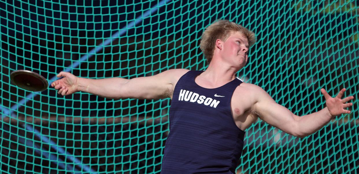 Hudson's Blake Toth competes in the boys discus throw event during the Suburban League National Conference track and field championship meet in Twinsburg on Wednesday.