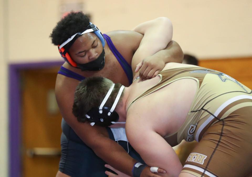 Clarkstown North's Justin Smoot defeats Clarkstown South's Alfred Smith in a 285-pound match during a dual meet at Clarkstown North High School in New City on Thursday, January 27, 2022.  Clarkstown South won the meet 41-30.