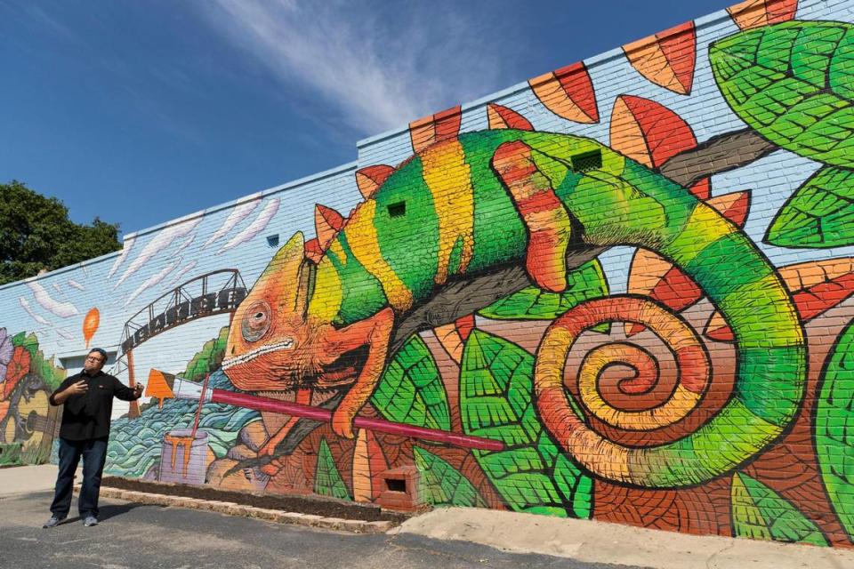 Michael Geddings shows his mural in downtown Cayce on Friday.