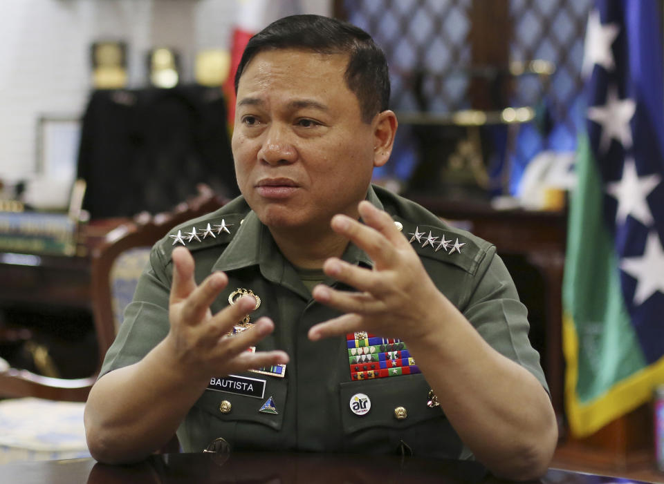 Philippine Military Chief Emmanuel Bautista gestures during an interview at Camp Aquinaldo military headquarters in suburban Quezon city, north of Manila, Philippines on Thursday, Feb. 20, 2014. Bautista says Beijing’s territorial claims in the South China Sea are “nonsense” and vowed to defend fishermen if they face intimidation by Chinese naval forces in the waters. (AP Photo/Aaron Favila)