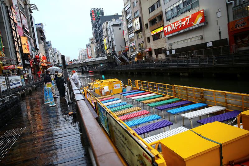 A ship is pictured on an almost empty pier in the Dotonbori entertainment district of Osaka