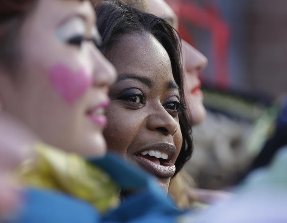 Actress Octavia Spencer rides with members of the Hasty Pudding Theatricals during a parade to honor Spencer as the Hasty Pudding Theatricals Woman of the Year Thursday, Jan. 26, 2017, in Cambridge, Mass. (AP Photo/Stephan Savoia)