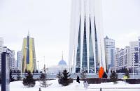 A woman walks in Astana, Kazakhstan, on Monday, Jan. 23, 2017. Astana, the capital city of Kazakhstan, which is hosting Syria peace talks, is a relatively new name on the map. Founded in the early 19th century as a Russian empire outpost, Akmolinsk was a backwater in the wind-swept steppe. That changed in 1994 when Kazakhstan's first president decided to move the capital from the commercial center Almaty, and Akmolinsk was renamed Astana.(AP Photo/Sergei Grits)