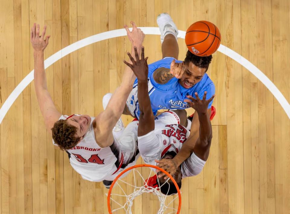 North Carolina’s Armando Bacot (5) goes to the basket against N.C. State’s Mohamed Diarra (23) in the second half on Wednesday, January 10, 2024 at PNC Arena in Raleigh, N.C.