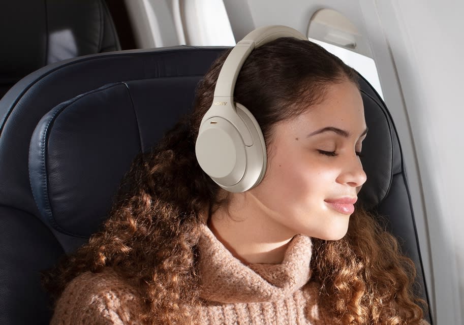 Sony's noise-cancelling headphones can block out the sound of chatting on a plane or provide you with some extra piece and quiet on the beach. (Image: Sony)