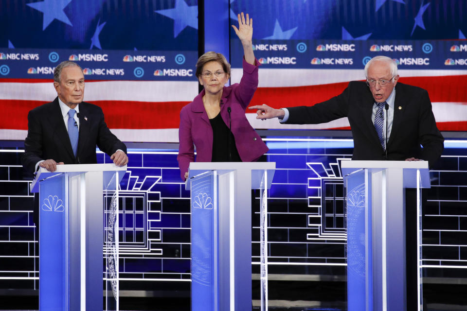 From left, Democratic presidential candidates, former New York City Mayor Mike Bloomberg, Sen. Elizabeth Warren, D-Mass., Sen. Bernie Sanders, I-Vt., participate in a Democratic presidential primary debate Wednesday, Feb. 19, 2020, in Las Vegas, hosted by NBC News and MSNBC. (AP Photo/John Locher)