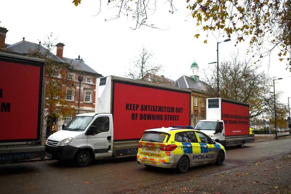 The Community United against Labour Party anti-Semitism group parks three billboards outside Labour Race and Faith Manifesto launch (Getty Images)