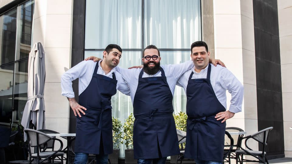 From left to right: Omar, Mohammad, and Wassim Orfali outside their restaurant in Dubai. - Orfali Bros Bistro