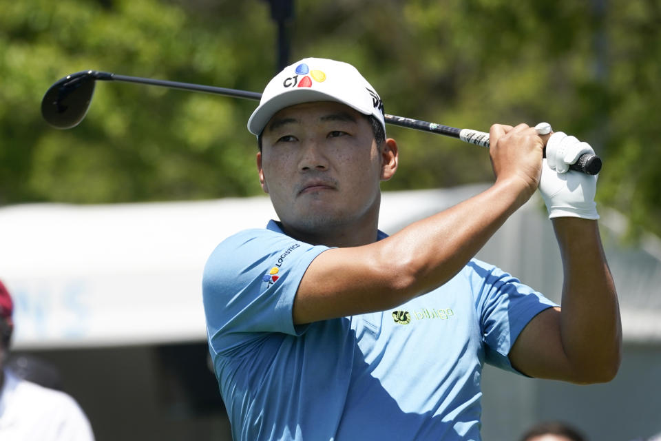 Sung Kang, of South Korea, watches his shot off the tee on the first hole during the first round of the AT&T Byron Nelson golf tournament, Thursday, May 13, 2021, in McKinney, Texas. (AP Photo/Tony Gutierrez)