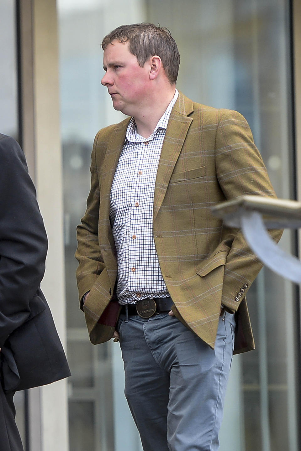 Oliver Walker's father Andrew leaving Bradford Coroners Court at the inquest of his son's death (Picture: SWNS)