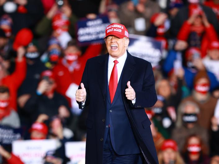U.S. President Donald Trump gestures during a campaign rally on October 17, 2020 in Muskegon, Michigan.