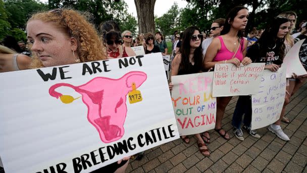 PHOTO: Abortion-rights advocates gather outside a the Kansas Statehouse in Topeka, Kan., to protest the U.S. Supreme Court's ruling on abortion, June 24, 2022. (Charlie Riedel/AP, FILE)