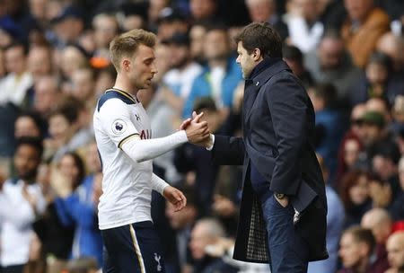 Britain Soccer Football - Tottenham Hotspur v Southampton - Premier League - White Hart Lane - 19/3/17 Tottenham's Christian Eriksen shakes hands with manager Mauricio Pochettino as he is substituted Reuters / Eddie Keogh Livepic