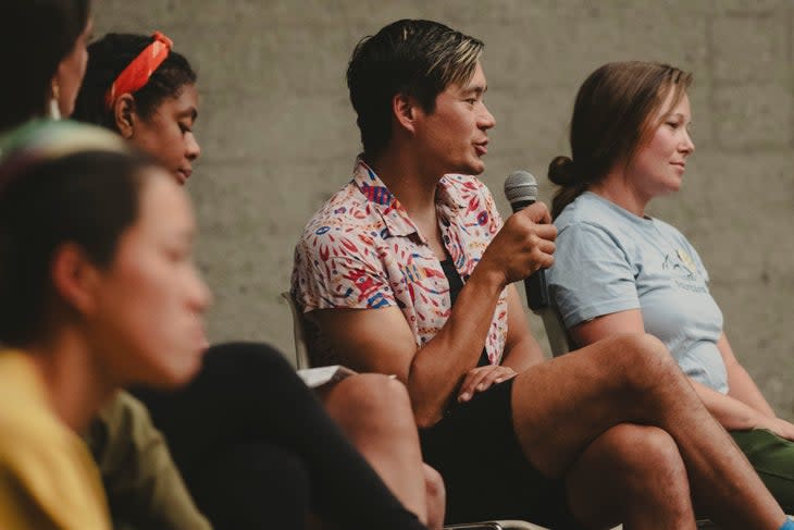 <span class="article__caption">Evening events included a panel of speakers from different affinity groups like Brown Girls Climb, Queer Crush Climbing, and more. Here Thomas Bukowski shares some of his insight on topics of diversity and inclusion in the outdoor space.</span> (Photo: Miya Tsudome)