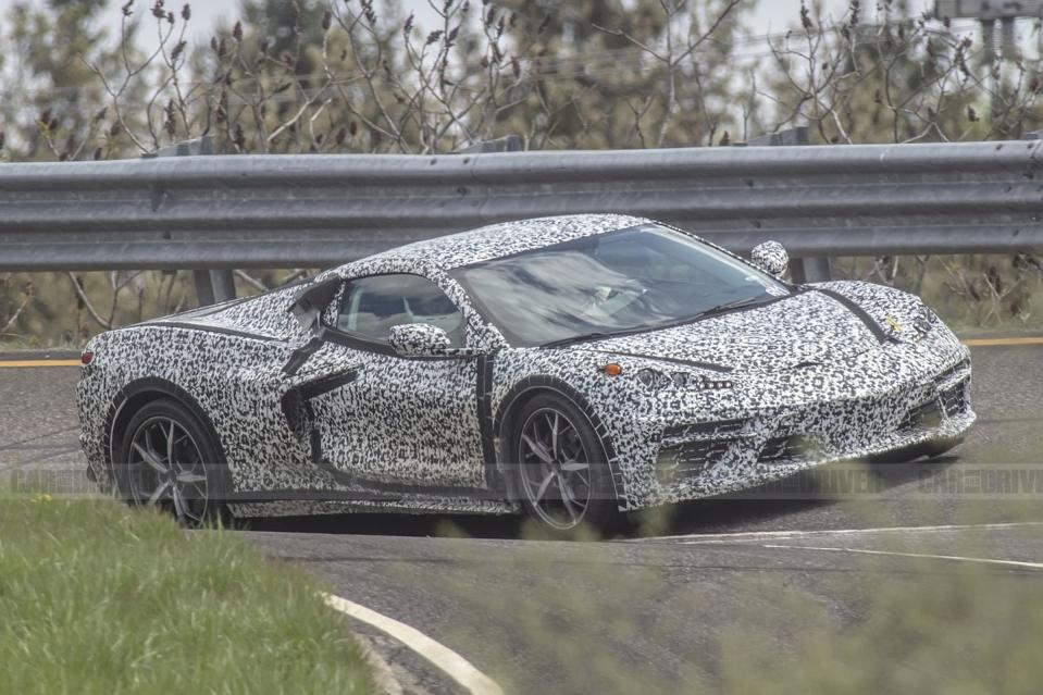 <p>This model doesn't have the same body kit as earlier prototypes, lacking a lower front splitter that we <a href="https://www.caranddriver.com/photos/g20722222/fresh-mid-engine-corvette-spy-shots-reveal-new-details-gallery/?slide=15" rel="nofollow noopener" target="_blank" data-ylk="slk:saw in earlier photos;elm:context_link;itc:0;sec:content-canvas" class="link ">saw in earlier photos</a>. This might suggest that it's a base model without a performance package (which will likely keep the same Z51 codename) or any aerodynamic add-ons.</p>