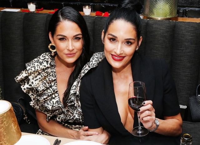 Nikki Bella takes a lunch break with twin sister Brie