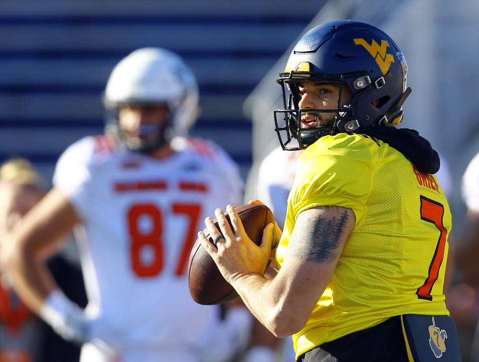 South quarterback Will Grier of West Virginia throws a pass during practice for the Senior Bowl (AP Photo)