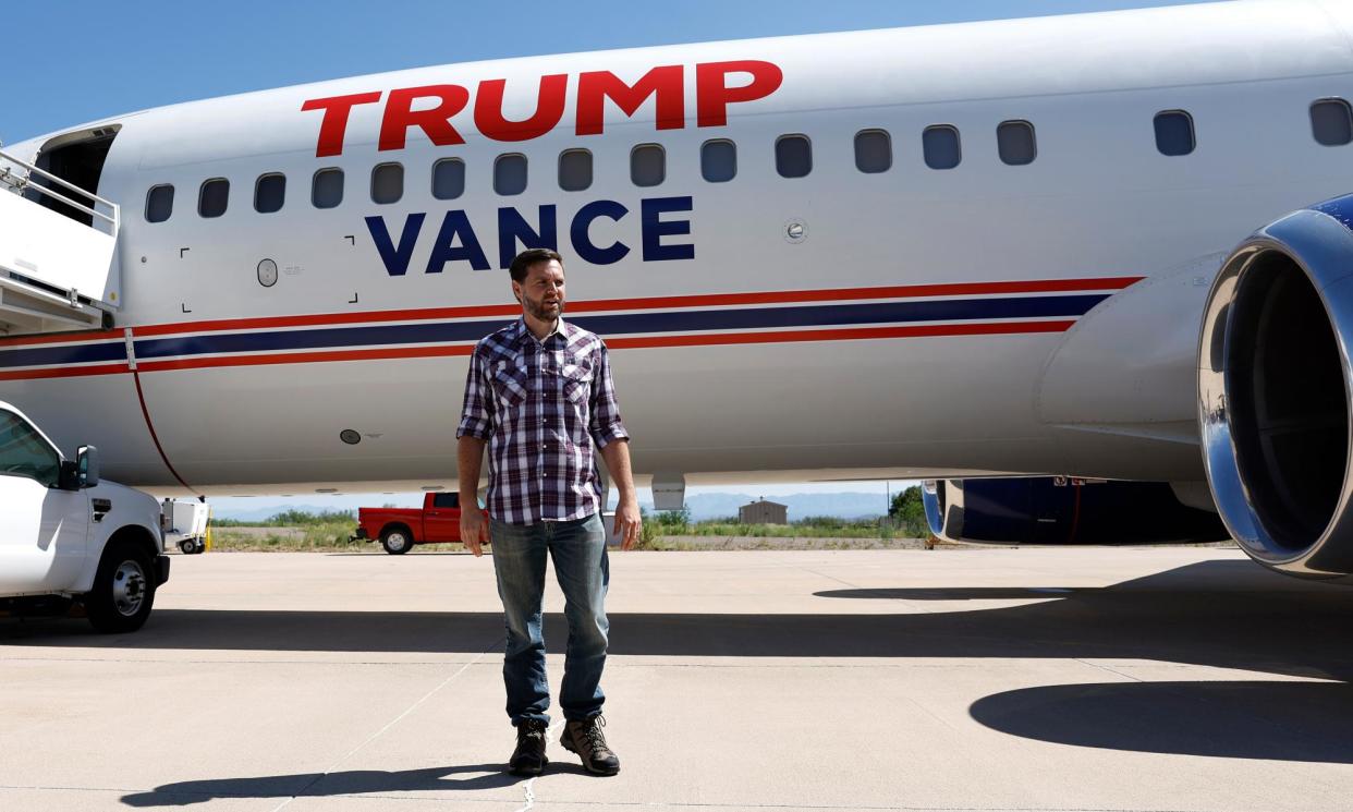 <span>JD Vance by his campaign jet in Tucson, Arizona on Thursday.</span><span>Photograph: Anna Moneymaker/Getty Images</span>