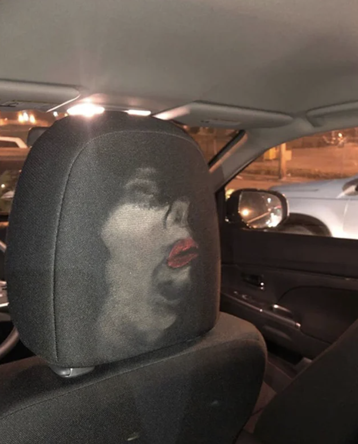 A face smudge on the back of a car seat