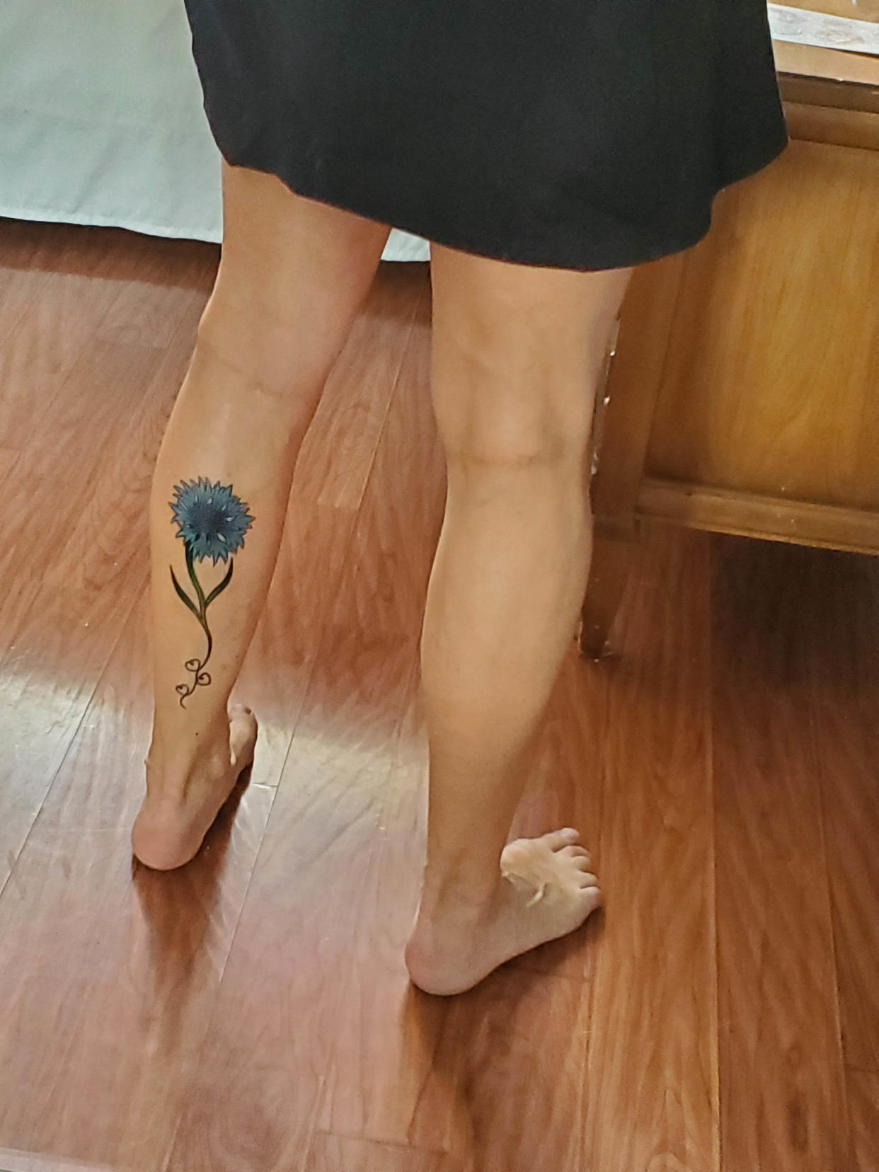Melania Murphy's tattoo of a flower on her calf. (Courtesy Melania Murphy)