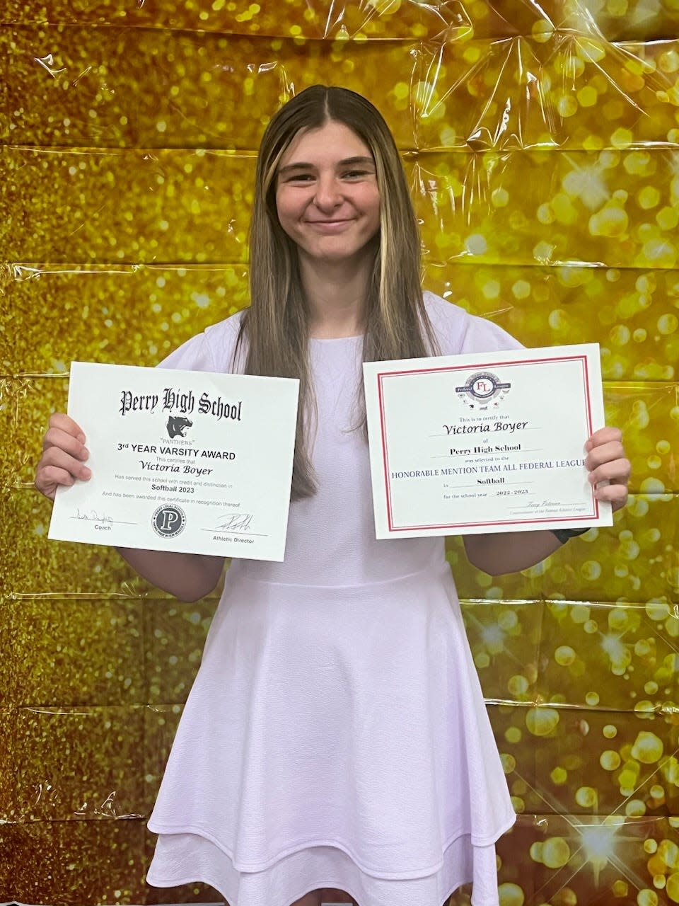 Victoria Boyer of Perry High School is the female winner of the 2023 Thurman Munson Catcher's Scholarship awarded by the Boys and Girls Club of Canton at J. Babe Stearn Community Center.