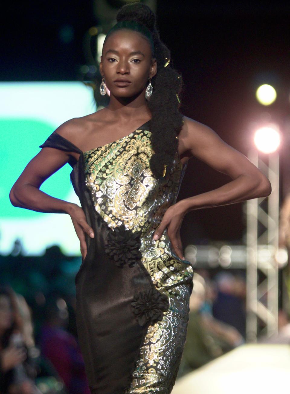 Models show off the latest fashion trends at the 12th annual Rochester Fashion Week's Light up the Night Finale Runway Show.