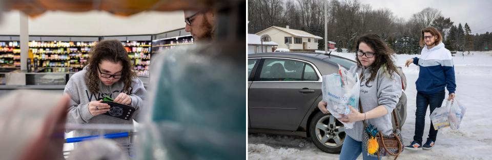 LEFT: Amedy Dewey, 24, looks through her wallet, searching for her credit card as she shops inside Walmart with her boyfriend, Charles Austin, 21, in Ludington on Thursday, Jan. 25, 2024. RIGHT: Amedy and her boyfriend Charles carry groceries in from the car.