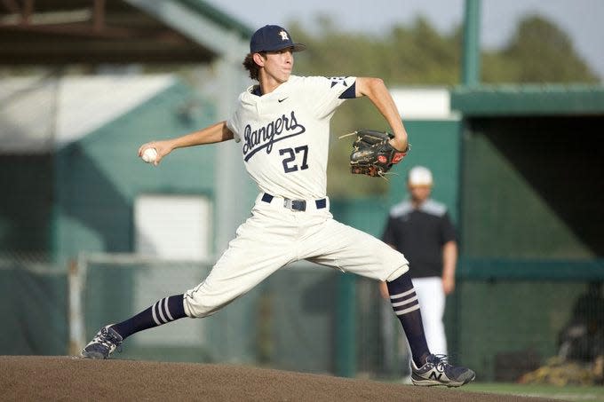 Riverside's Orlando Samaniego delivers a pitch vs. Snyder on Friday night in Game 1 of the Class 4A, regional quarterfinals at Christensen Stadium in Midland.