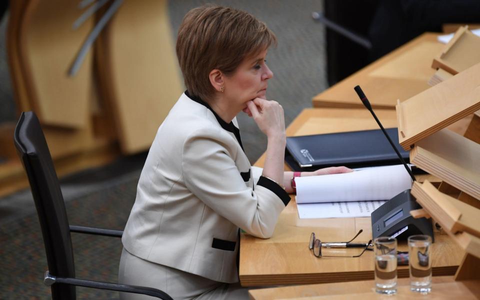 First Minister Nicola Sturgeon ahead of a statement on new COVID-19 restrictions  - Andy Buchanan/PA