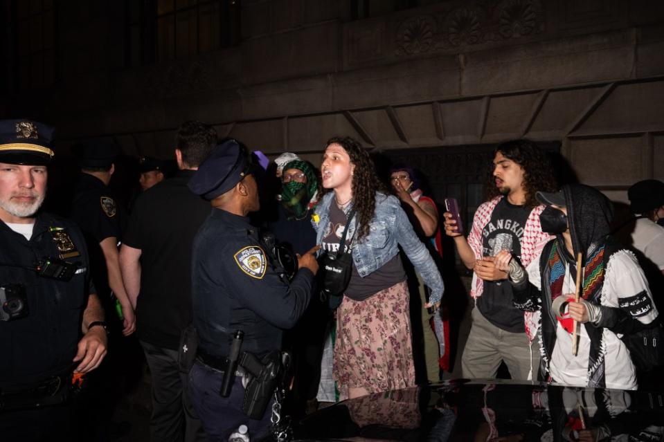 Several members of each group rushed up to one another and engaged in some mild pushing on the street until the NYPD stepped in before it escalated. Adam Gray for the New York Post