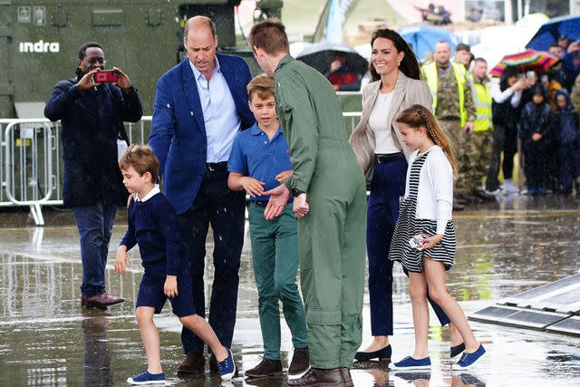 <p>Ben Birchall/PA Images via Getty Images</p> The Prince and Princess of Wales with Prince George, Princess Charlotte and Prince Louis visit Royal International Air Tattoo (RIAT) at RAF Fairford.