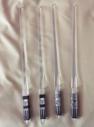 Two pairs of LED lightsaber chopsticks