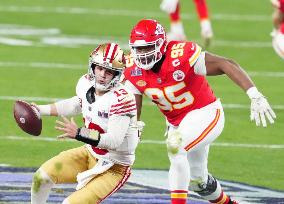 San Francisco 49ers quarterback Brock Purdy (13) is pressured by Kansas City Chiefs defensive tackle Chris Jones (95) in the second half.