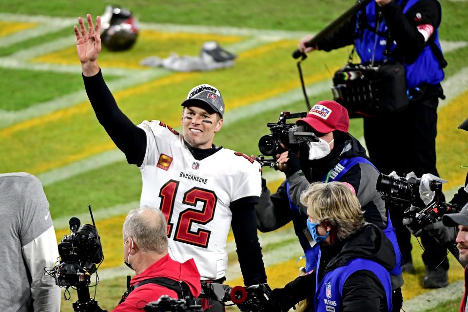 Tampa Bay Buccaneers quarterback Tom Brady celebrates after beating the Green Bay Packers in the NFC championship game Jan. 24, 2021, at Lambeau Field.