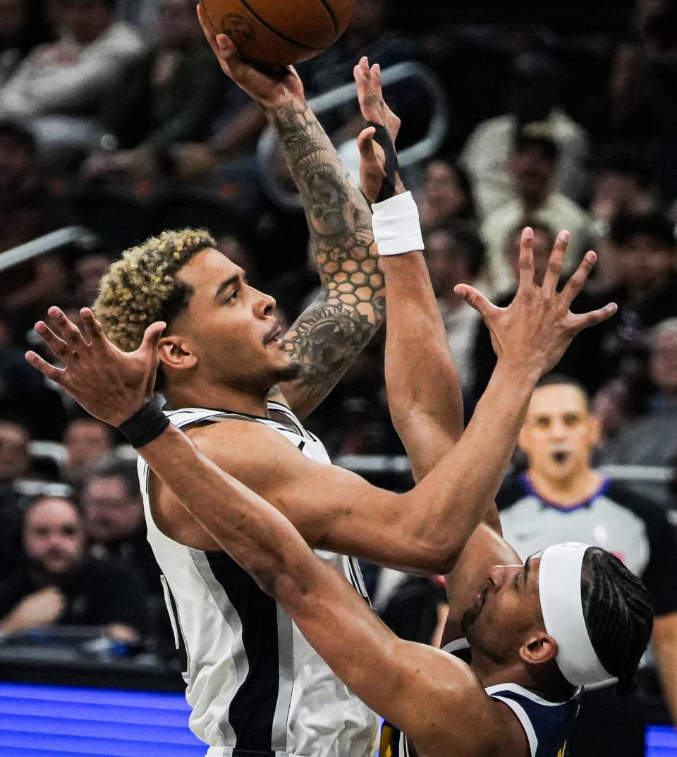 San Antonio Spurs forward Jeremy Sochan goes up for a shot as Denver Nuggets forward Zeke Nnaji defends during Friday night's 117-106 Nuggets win at Moody Center. The Spurs played two games in Austin over the weekend.