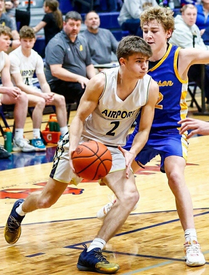 Colin Nowak drives the baseline for Airport during a75-62 win over Jefferson Tuesday night.