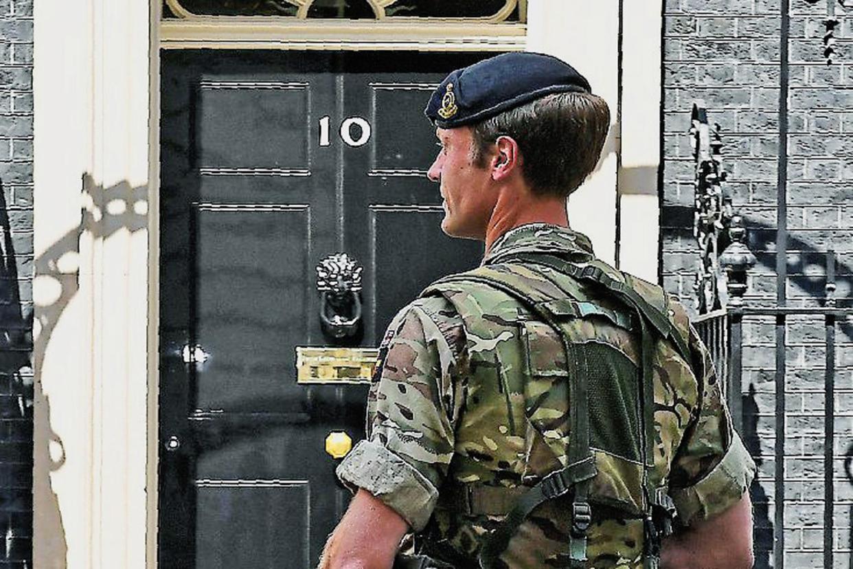 Heightened alert: a soldier patrols Downing Street this week: Getty Images