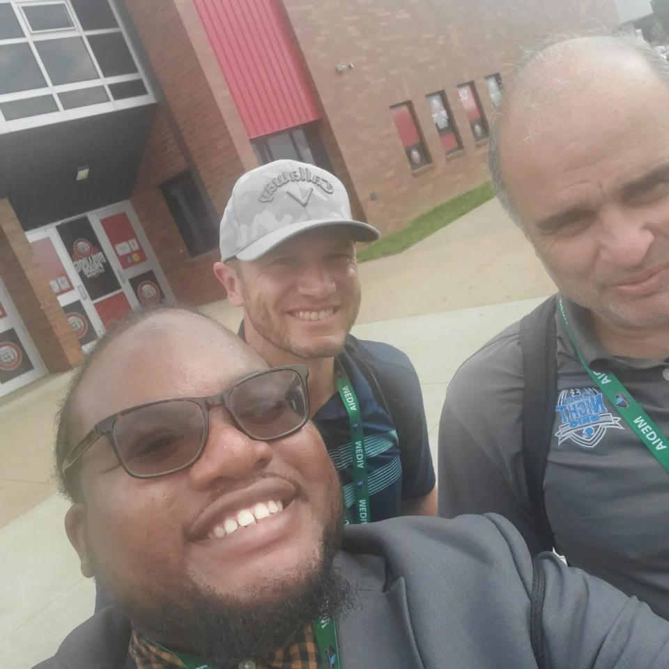 Peter Holland Jr, joins fellow Canton Repository sports writers Josh Weir (middle) and Mike Popovich (right) in walking together during the 2022 Pro Football Hall of Fame Enshrinement.